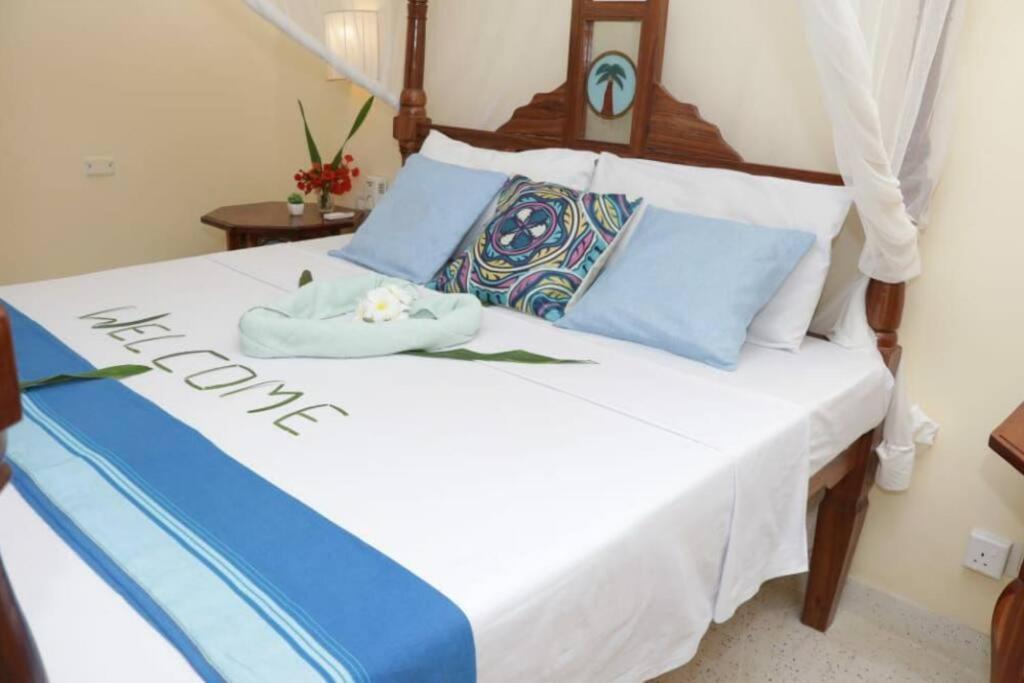 Tembo Beach Cottage Малинди Экстерьер фото